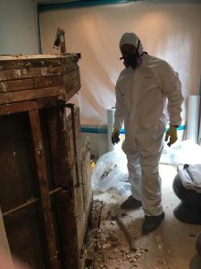 fire damage restoration crew cleans a house